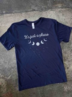 T shirt that says "it's just a phase".